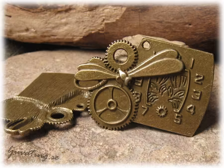 Steampunk hänge klocka avlång bronsfärg ca 46x29mm