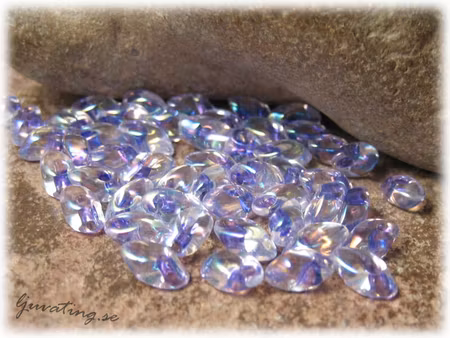 Long Magatamas lilac lined crystal AB 4x7 mm