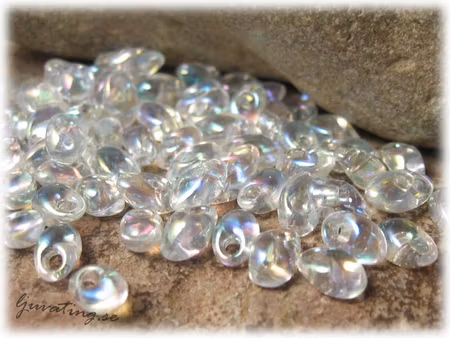 Long Magatamas crystal AB 4x7 mm