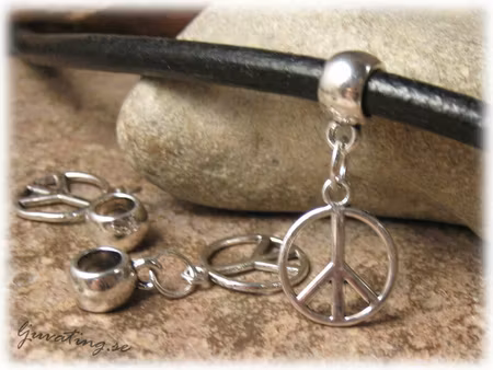 Hänge hanger med peacemärke ca 31x18 mm