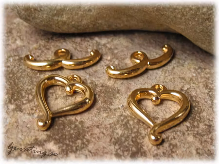 Toggle lås hjärta guldfärgat ca 17x14 mm