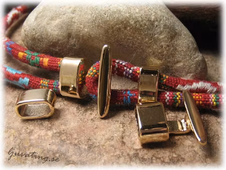 T-lås till band ljusljus guldfärgat hål ca 10x5 mm