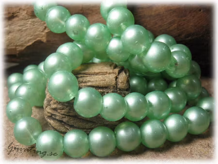 Glaspärlor transparent mintgrön 20-pack ca 10 mm