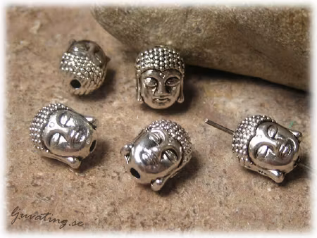 Buddha huvud silverfärgad metall ca 11x9 mm