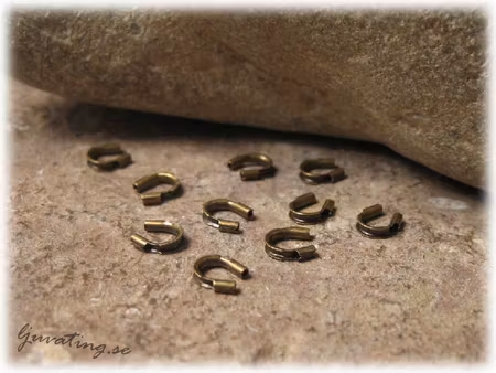 Wireskydd bronsfärgade 10-pack ca 5x4 mm