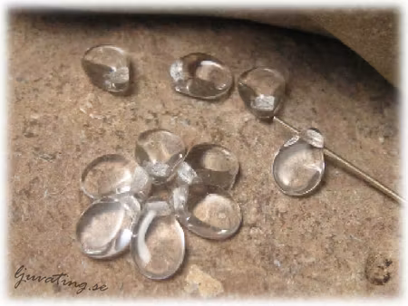 Preciosa pip bead clear 12-pack ca 5x7 mm