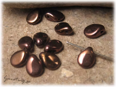 Preciosa pip bead jet vega koppar 12-pack ca 5x7mm