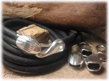 Ormlås haklås i metall silverfärgat hål ca 10x5 mm