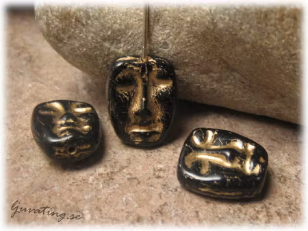 Mask ansikte svart med inlägg guld/bronze 13x11 mm