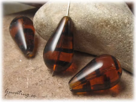 Tortoise droppe i glas topaz svart brun ca 28x16mm