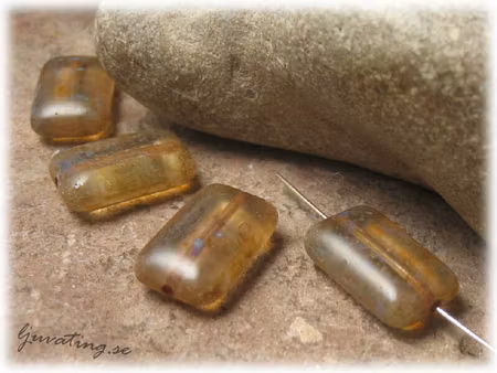 Ljus topaz melerad rektangel ca 16x10 mm