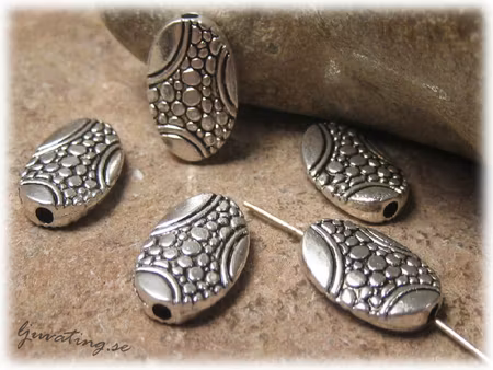 Flat oval metallpärla orm/snake mönster ca 14x9 mm