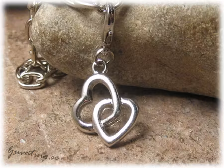 Berlock litet dubbelhjärta 20x16 mm med klolås