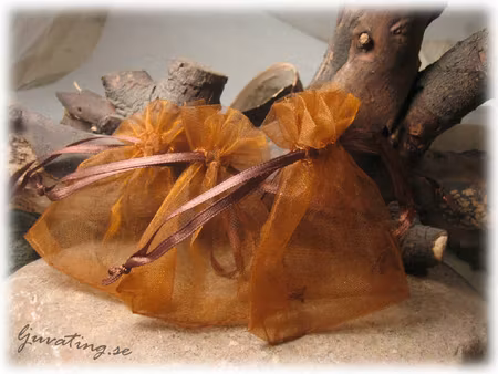 Smyckepåse brun enfärgad modell mindre ca 9x7cm