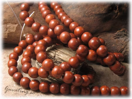 Runda i howlite brun melerad 20-pack ca 8 mm