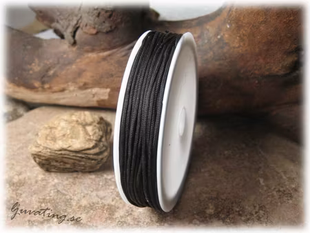 Nylontråd tex. till makrame svart brännbar ca 1 mm