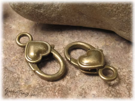 Karbinhake klolås bronsfärgat hjärta ca 27x15 mm