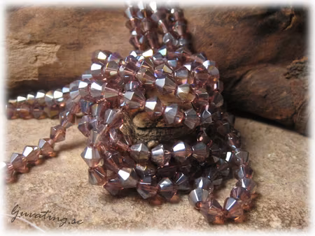 Facetterad glaspärla i lilaton AB bicone 30-pack ca 6 mm