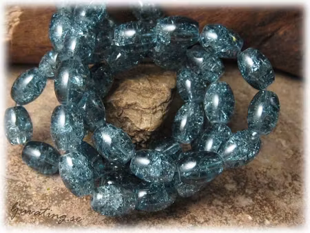 1 sträng krackelerad gråblå oval glaspärla ca11x8mm