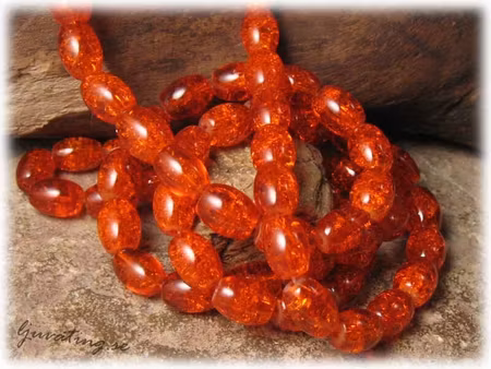 1 sträng krackelerad orange oval glaspärla ca 11x8 mm