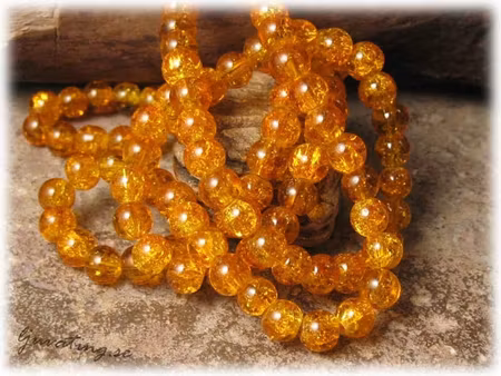 1 sträng krackelerad lejongul glaspärla ca 6 mm