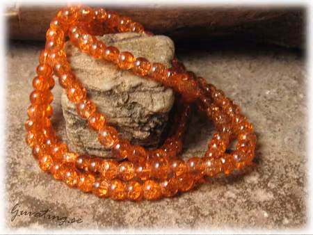 1 sträng krackelerad orange glaspärla ca 4 mm