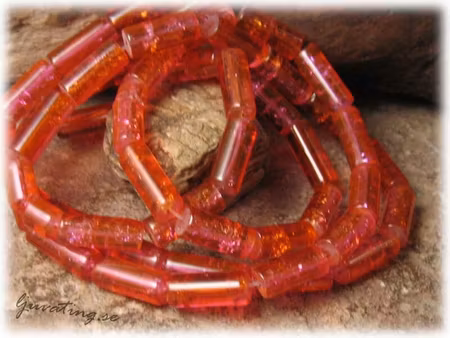 1 sträng krackelerad orangerosa tub pärla ca16x6 mm
