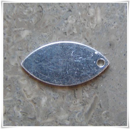 Tag sterling silver för stämpling