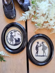 Vintage tavlor med siluettklippta motiv, 2 styck
