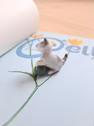 Miniatyrfigur Lekande kattunge, Metzler & Ortloff