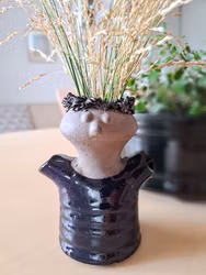 Blomsterflicka av Aimo Nietosvuori, Jie Gantofta