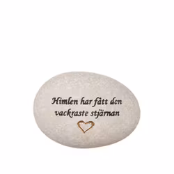 Natursten med texten "Himlen har fått den vackraste stjärnan"