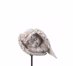 Ängel på stick – i vingars famn