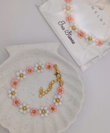 Romantisk blomsterarmbånd i rosa, hvitt og gull