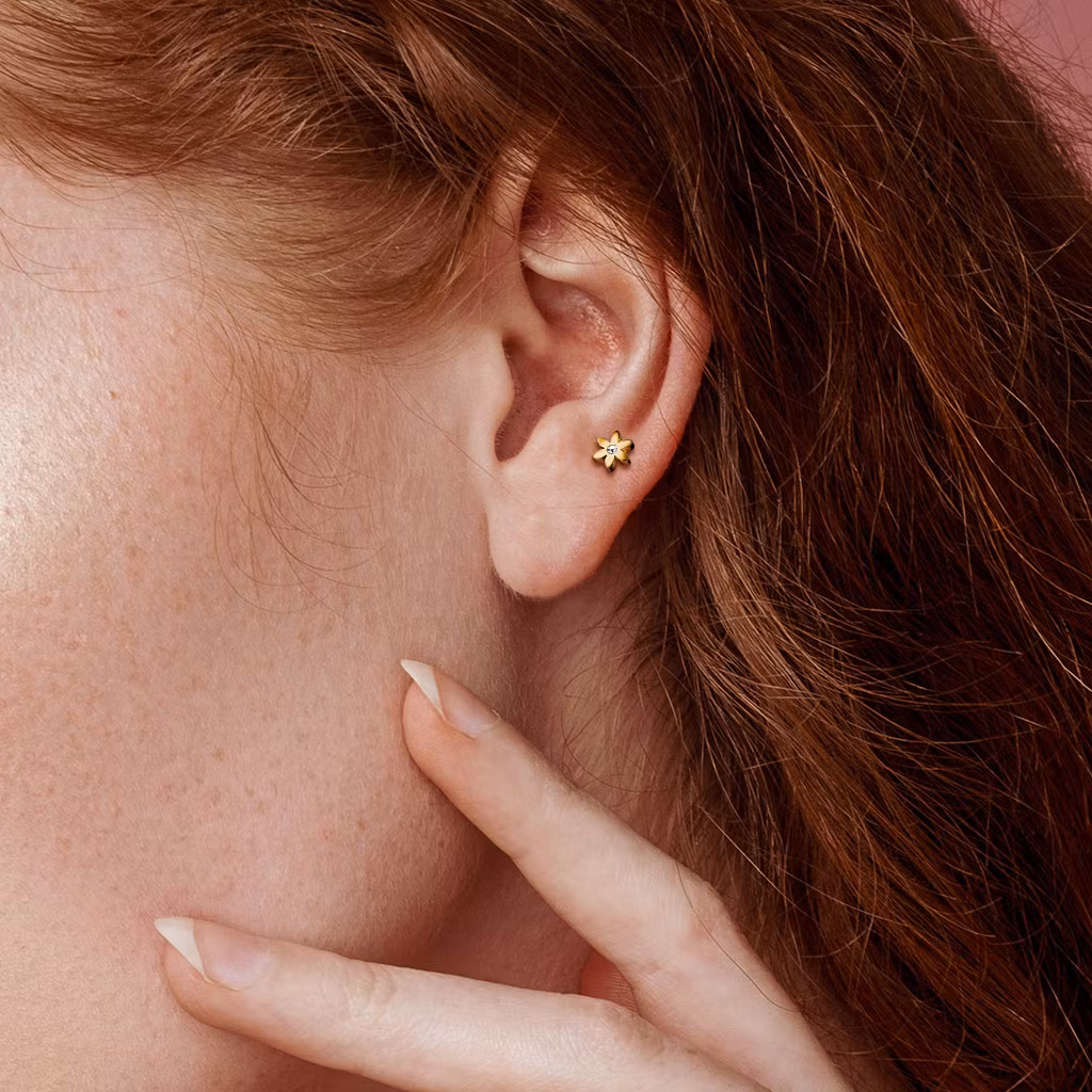Tragus barbell med blomma och CZ