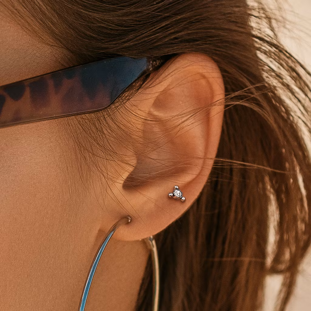 Tragus barbell kirurgiskt stål - Triangelkluster med klar cubic zirconia