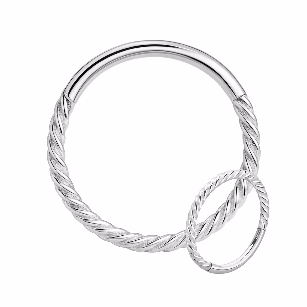 Titanium segmentring 1.2mm med gångjärn och twistad design