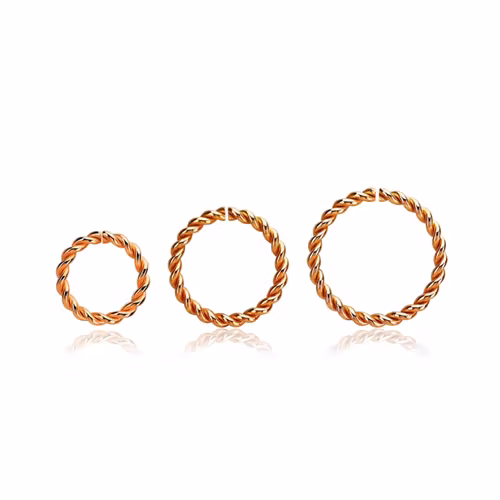 PVD-Pläterad roséguld sömlös ring twistad design 1.2mm