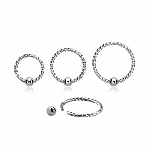 Sömlös ring twistad design 1mm med 2.5mm kula