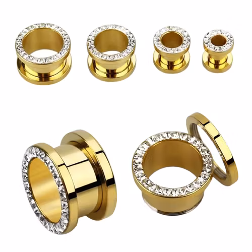 Guldfärgad tunnel i stål med limmade crystals