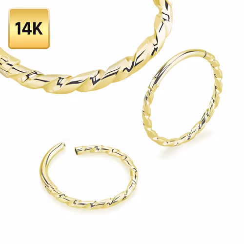 Clicker ring 1.0mm i äkta 14 karat guld med twistad design