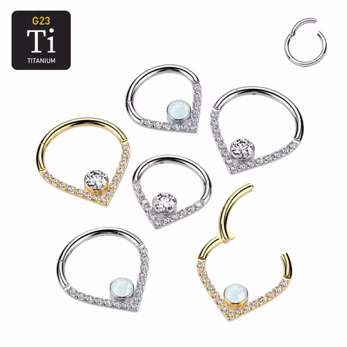 Segmentring i titanium 1.2mm - droppformad design cubic zirconia och centrerad rund CZ eller opal
