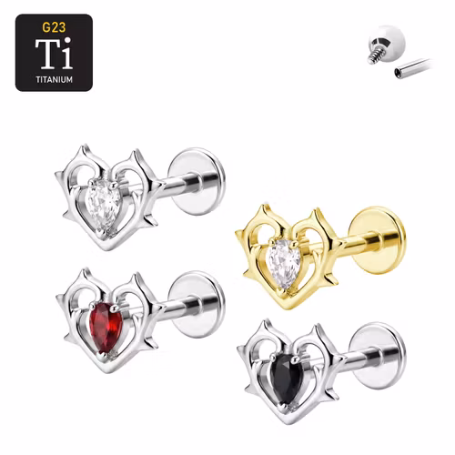 Labret i titanium 1.2mm invändigt gängad med taggigt hjärta & droppformad CZ