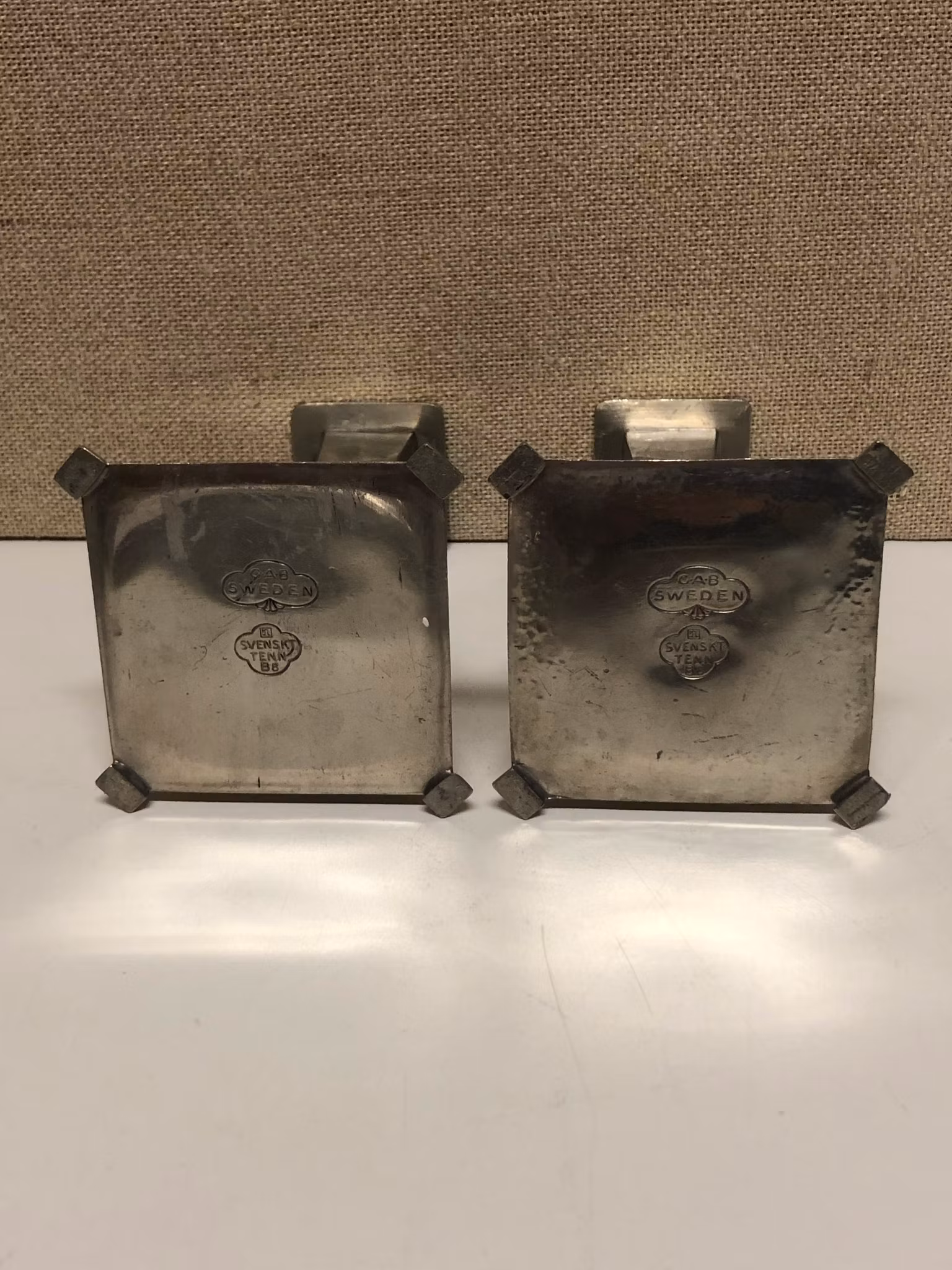 CANDLE STOCKERS, a pair, pewter, GAB Sweden, 1928.