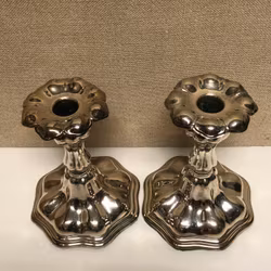CANDLESTICKS, a pair, nickel silver, mid-20th century.