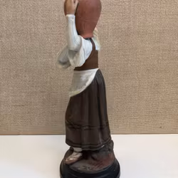 FIGURINE, ceramic, "The Water Carrier, first half of the 20th century.