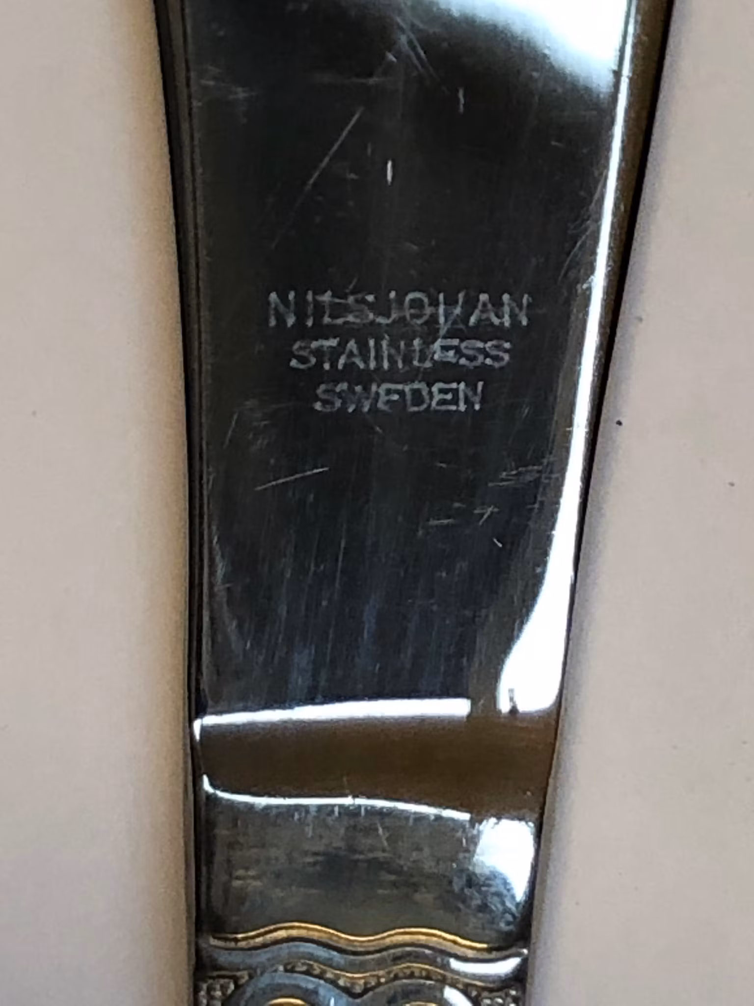 SONJA KATZIN. Smörkniv, rostfritt, "Sessan", Nils Johan.