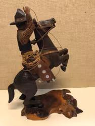 WOODEN SCULPTURE, Cowboy, signed KED 1948.