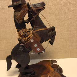 TRÄSKULPTUR, Cowboy, signerad K.E.D. samt daterad 1948.