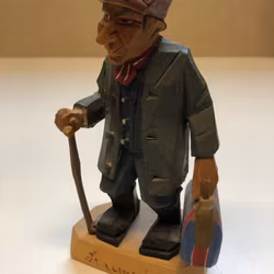 SKULPTUR, trä, "På resande fot", monogramsignerad GN.